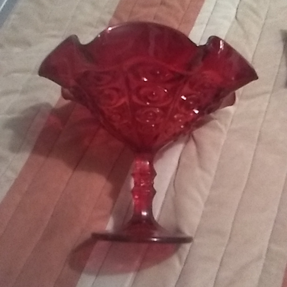 Red glass pedestal bowl